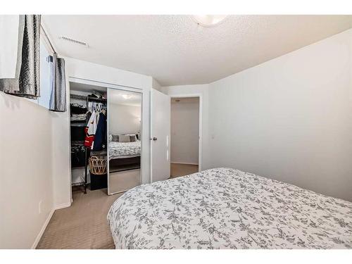 15 Prestwick Row Se, Calgary, AB - Indoor Photo Showing Bedroom