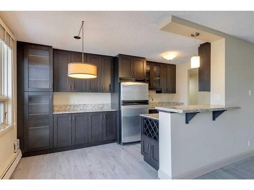 1503-733 14 Avenue Sw, Calgary, AB - Indoor Photo Showing Kitchen With Stainless Steel Kitchen