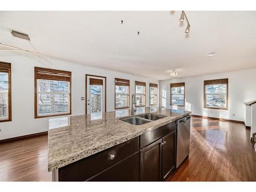 114 Bow Ridge Crescent, Cochrane, AB - Indoor Photo Showing Kitchen With Double Sink