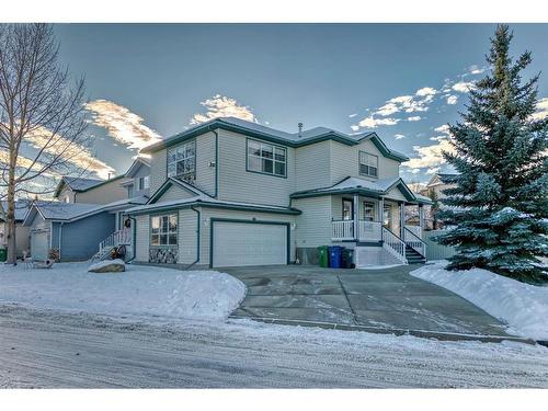 114 Bow Ridge Crescent, Cochrane, AB - Outdoor With Facade