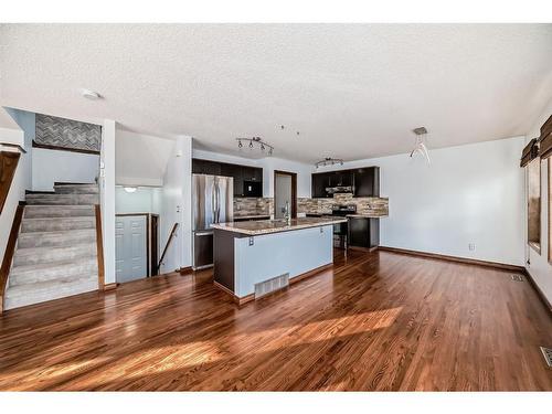 114 Bow Ridge Crescent, Cochrane, AB - Indoor Photo Showing Kitchen