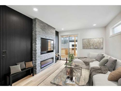 1930 27 Street Sw, Calgary, AB - Indoor Photo Showing Living Room With Fireplace