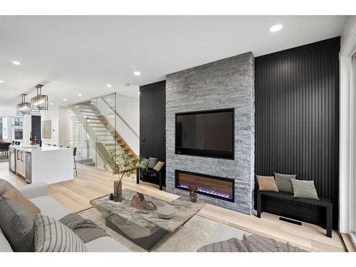 1930 27 Street Sw, Calgary, AB - Indoor Photo Showing Living Room With Fireplace