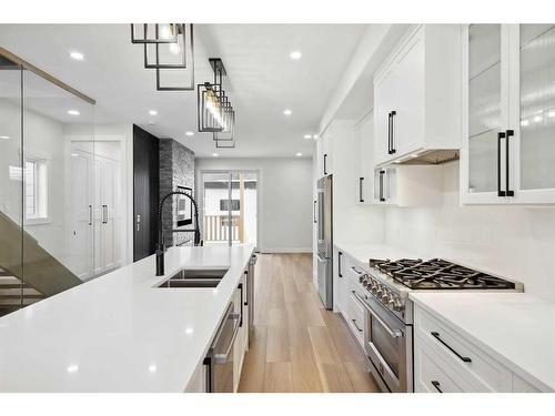 1930 27 Street Sw, Calgary, AB - Indoor Photo Showing Kitchen With Double Sink With Upgraded Kitchen