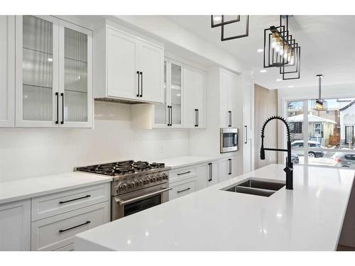 1930 27 Street Sw, Calgary, AB - Indoor Photo Showing Kitchen With Double Sink With Upgraded Kitchen