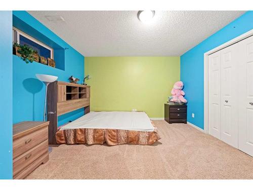 129 Cranford Drive Se, Calgary, AB - Indoor Photo Showing Bedroom