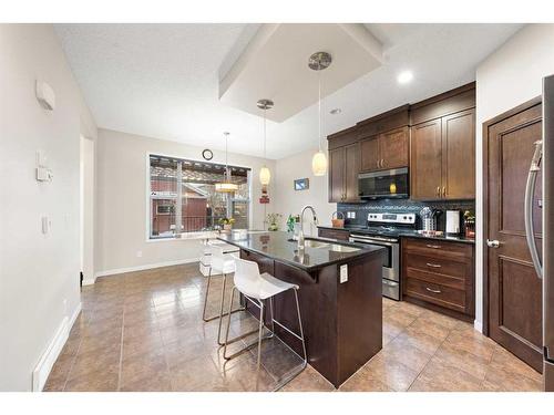 129 Cranford Drive Se, Calgary, AB - Indoor Photo Showing Kitchen With Upgraded Kitchen