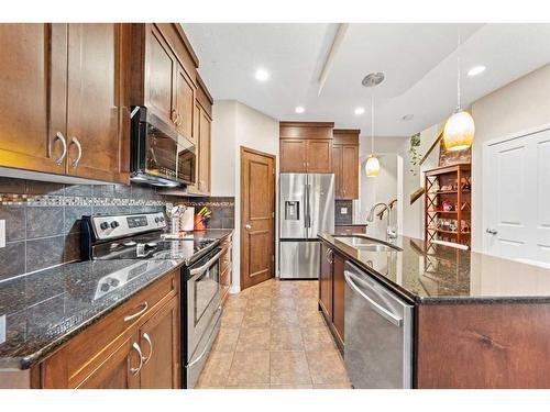 129 Cranford Drive Se, Calgary, AB - Indoor Photo Showing Kitchen With Upgraded Kitchen