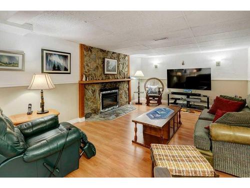 475 Rundlelawn Way Ne, Calgary, AB - Indoor Photo Showing Living Room With Fireplace