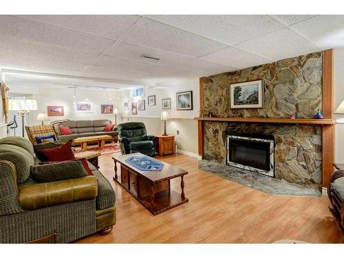 475 Rundlelawn Way Ne, Calgary, AB - Indoor Photo Showing Living Room With Fireplace