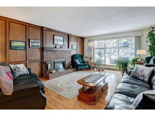 475 Rundlelawn Way Ne, Calgary, AB - Indoor Photo Showing Living Room With Fireplace