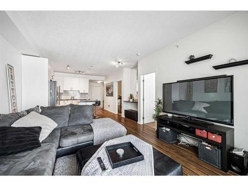 1402-99 Copperstone Park Se, Calgary, AB - Indoor Photo Showing Living Room