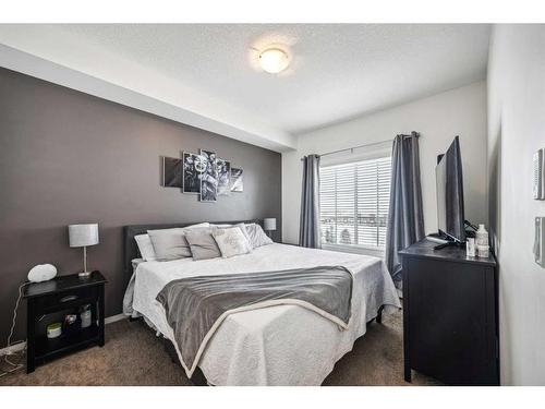 1402-99 Copperstone Park Se, Calgary, AB - Indoor Photo Showing Bedroom