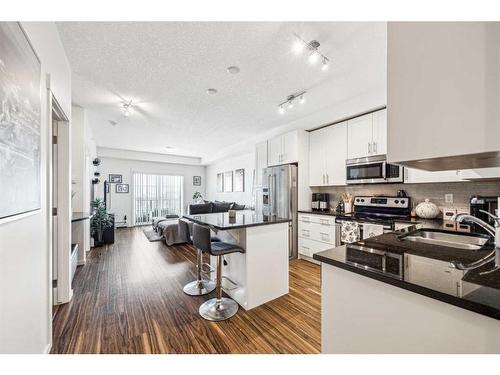 1402-99 Copperstone Park Se, Calgary, AB - Indoor Photo Showing Kitchen With Upgraded Kitchen