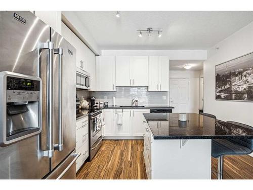 1402-99 Copperstone Park Se, Calgary, AB - Indoor Photo Showing Kitchen With Upgraded Kitchen