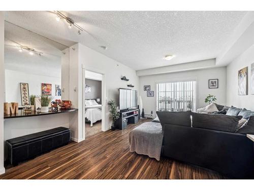 1402-99 Copperstone Park Se, Calgary, AB - Indoor Photo Showing Living Room