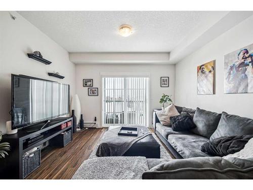 1402-99 Copperstone Park Se, Calgary, AB - Indoor Photo Showing Living Room