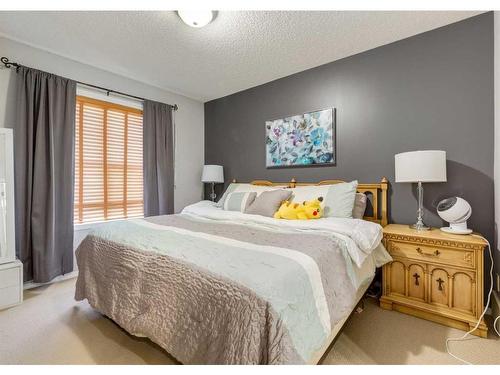 323 Toscana Gardens Nw, Calgary, AB - Indoor Photo Showing Bedroom