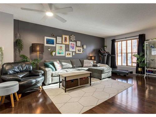 323 Toscana Gardens Nw, Calgary, AB - Indoor Photo Showing Living Room