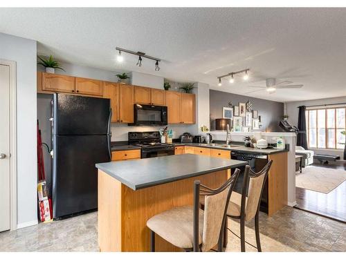 323 Toscana Gardens Nw, Calgary, AB - Indoor Photo Showing Kitchen