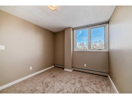 303-310 4 Avenue Ne, Calgary, AB - Indoor Photo Showing Other Room