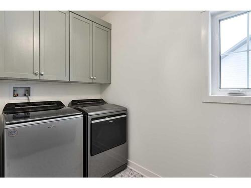 218 Red Tail Ridge Se, High River, AB - Indoor Photo Showing Laundry Room