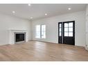 218 Red Tail Ridge Se, High River, AB  - Indoor Photo Showing Living Room With Fireplace 