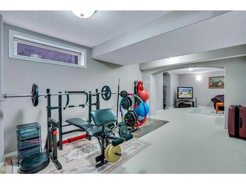 292 Riverview Close Se, Calgary, AB - Indoor Photo Showing Gym Room