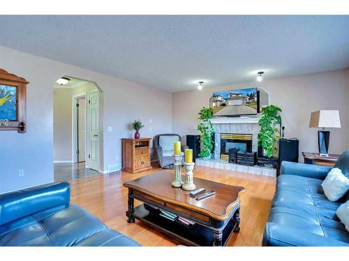 292 Riverview Close Se, Calgary, AB - Indoor Photo Showing Living Room With Fireplace