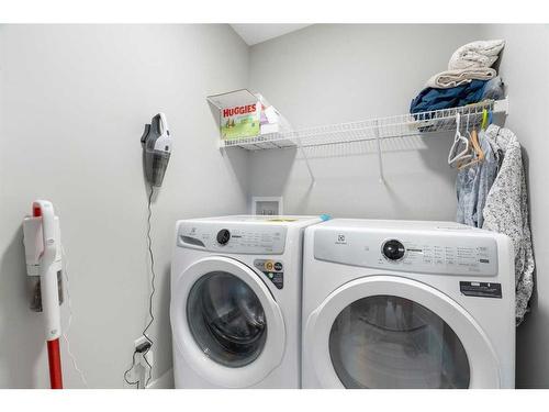 277 Ambleside Avenue Nw, Calgary, AB - Indoor Photo Showing Laundry Room