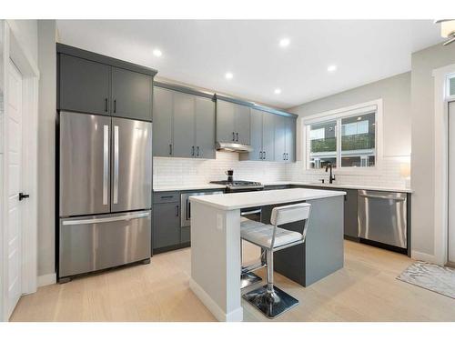 277 Ambleside Avenue Nw, Calgary, AB - Indoor Photo Showing Kitchen With Upgraded Kitchen