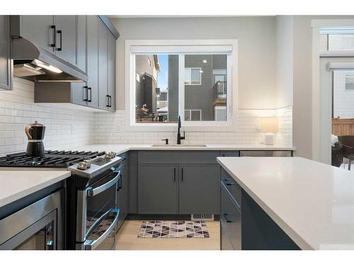 277 Ambleside Avenue Nw, Calgary, AB - Indoor Photo Showing Kitchen With Upgraded Kitchen