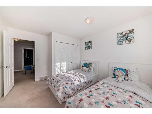 126 Hidden Creek Rise Nw, Calgary, AB - Indoor Photo Showing Bedroom