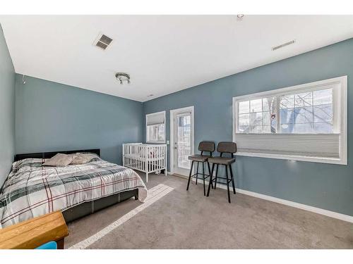 126 Hidden Creek Rise Nw, Calgary, AB - Indoor Photo Showing Bedroom