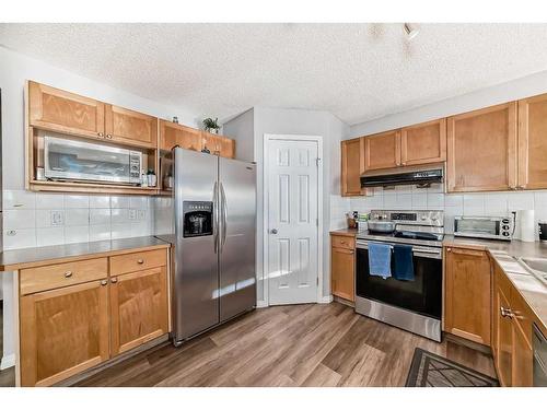 126 Hidden Creek Rise Nw, Calgary, AB - Indoor Photo Showing Kitchen