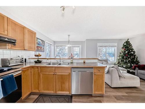 126 Hidden Creek Rise Nw, Calgary, AB - Indoor Photo Showing Kitchen With Stainless Steel Kitchen With Double Sink