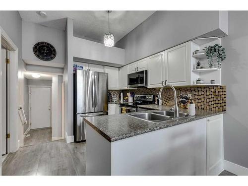 112 Chaparral Ridge Circle Se, Calgary, AB - Indoor Photo Showing Kitchen With Double Sink