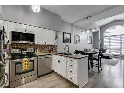 112 Chaparral Ridge Circle Se, Calgary, AB - Indoor Photo Showing Kitchen With Double Sink