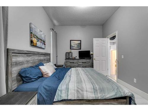 112 Chaparral Ridge Circle Se, Calgary, AB - Indoor Photo Showing Bedroom