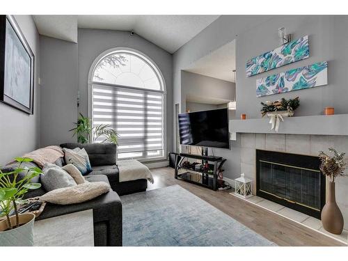 112 Chaparral Ridge Circle Se, Calgary, AB - Indoor Photo Showing Living Room With Fireplace