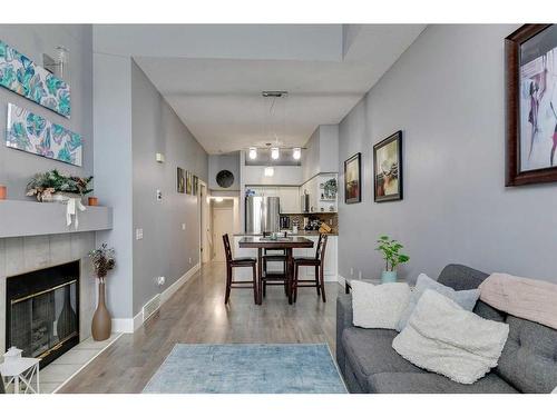 112 Chaparral Ridge Circle Se, Calgary, AB - Indoor Photo Showing Living Room With Fireplace