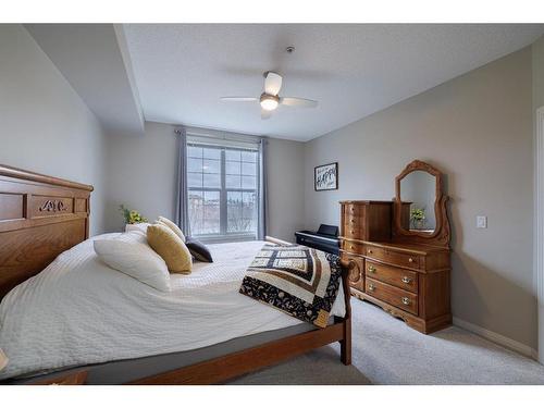 333-1 Crystal Green Lane, Okotoks, AB - Indoor Photo Showing Bedroom