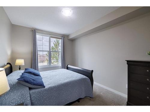 333-1 Crystal Green Lane, Okotoks, AB - Indoor Photo Showing Bedroom