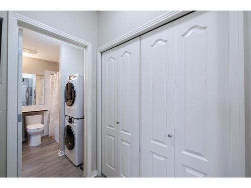 333-1 Crystal Green Lane, Okotoks, AB - Indoor Photo Showing Laundry Room