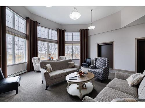 333-1 Crystal Green Lane, Okotoks, AB - Indoor Photo Showing Living Room