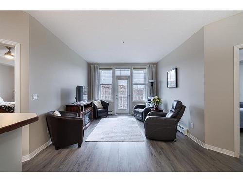 333-1 Crystal Green Lane, Okotoks, AB - Indoor Photo Showing Living Room