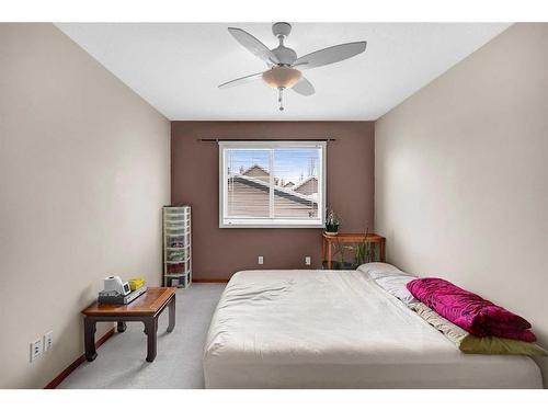 102 Cranberry Square Se, Calgary, AB - Indoor Photo Showing Bedroom