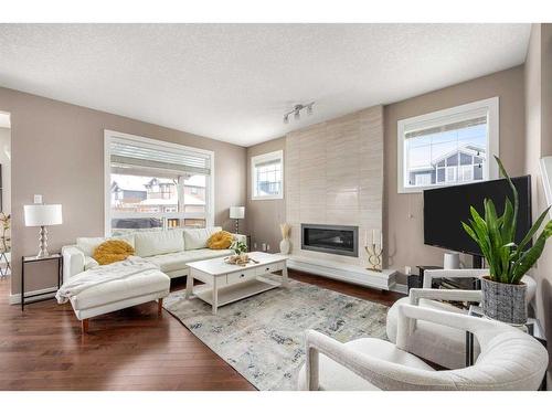 247 Valley Pointe Way Nw, Calgary, AB - Indoor Photo Showing Living Room With Fireplace