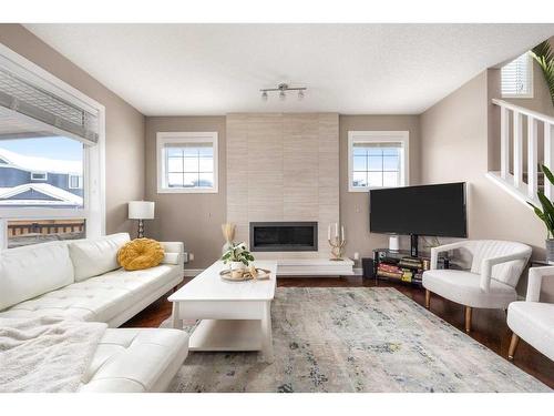 247 Valley Pointe Way Nw, Calgary, AB - Indoor Photo Showing Living Room With Fireplace