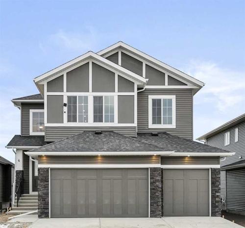 6 Fireside Point, Cochrane, AB - Outdoor With Facade